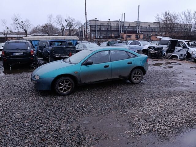 Зеленый Мазда 323, объемом двигателя 1.5 л и пробегом 300 тыс. км за 699 $, фото 1 на Automoto.ua