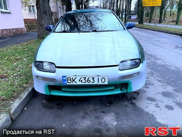 Зеленый Мазда 323, объемом двигателя 1.5 л и пробегом 334 тыс. км за 1800 $, фото 1 на Automoto.ua