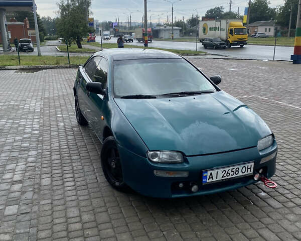 Зеленый Мазда 323, объемом двигателя 1.5 л и пробегом 426 тыс. км за 2300 $, фото 1 на Automoto.ua