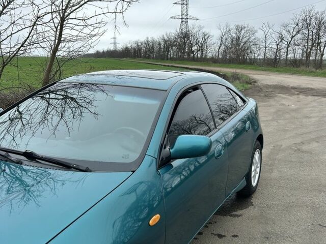 Зеленый Мазда 323, объемом двигателя 1.5 л и пробегом 8 тыс. км за 2900 $, фото 1 на Automoto.ua