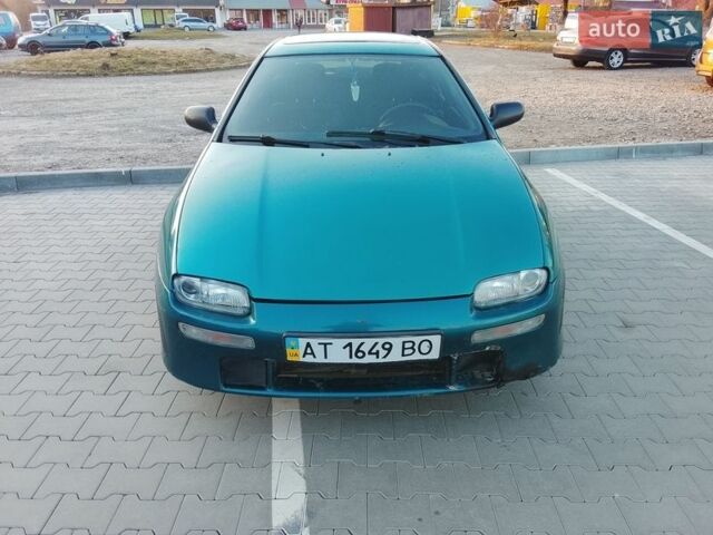 Зеленый Мазда 323, объемом двигателя 1.49 л и пробегом 180 тыс. км за 1750 $, фото 1 на Automoto.ua