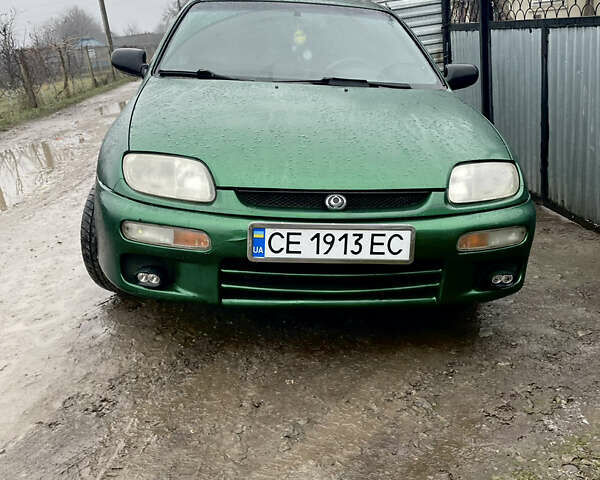 Зелений Мазда 323, об'ємом двигуна 1.5 л та пробігом 250 тис. км за 2600 $, фото 1 на Automoto.ua