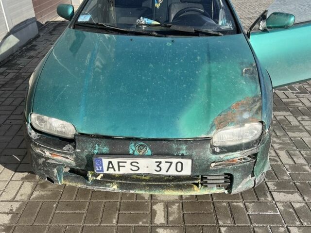 Зеленый Мазда 323, объемом двигателя 0 л и пробегом 250 тыс. км за 579 $, фото 1 на Automoto.ua