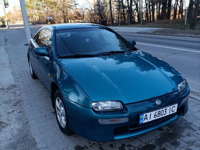 Зелений Мазда 323, об'ємом двигуна 1.5 л та пробігом 381 тис. км за 2400 $, фото 1 на Automoto.ua