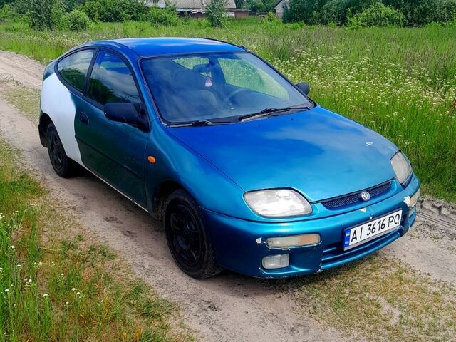 Зелений Мазда 323, об'ємом двигуна 1.5 л та пробігом 0 тис. км за 1300 $, фото 1 на Automoto.ua