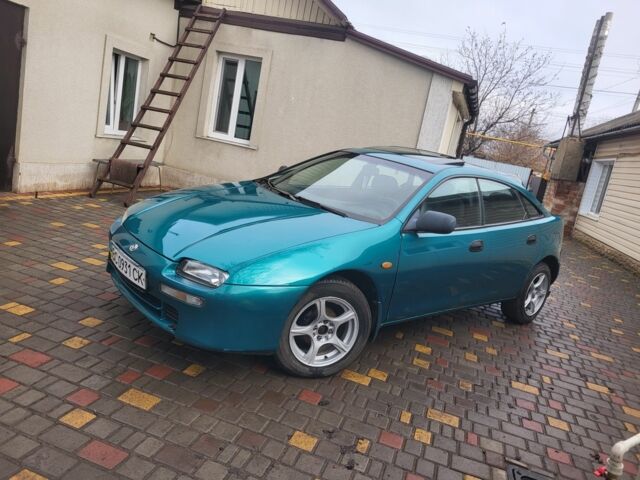 Зеленый Мазда 323, объемом двигателя 1.5 л и пробегом 270 тыс. км за 1999 $, фото 1 на Automoto.ua