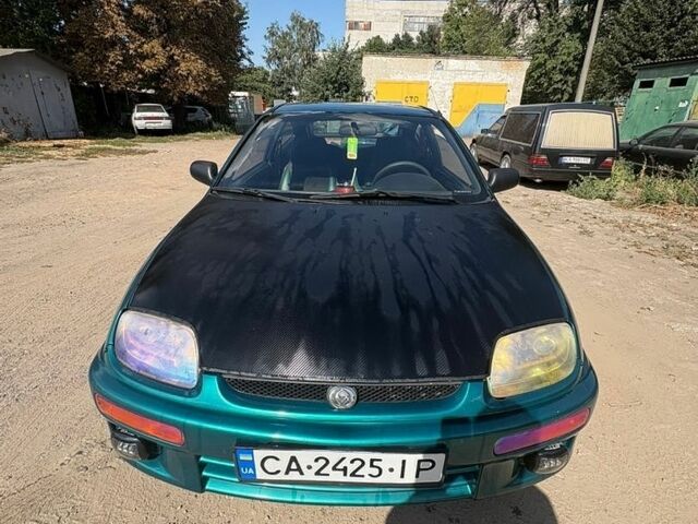 Зелений Мазда 323, об'ємом двигуна 1.49 л та пробігом 336 тис. км за 2700 $, фото 1 на Automoto.ua