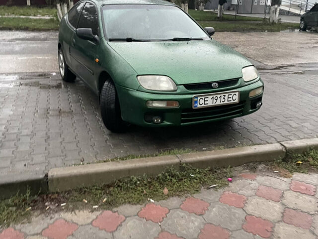 Зелений Мазда 323, об'ємом двигуна 1.5 л та пробігом 250 тис. км за 2200 $, фото 1 на Automoto.ua