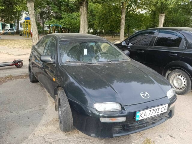 Зелений Мазда 323, об'ємом двигуна 1.5 л та пробігом 250 тис. км за 1150 $, фото 1 на Automoto.ua