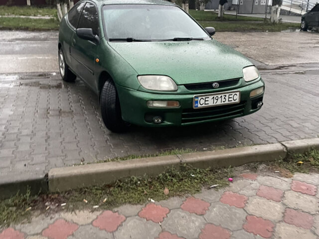 Зеленый Мазда 323, объемом двигателя 1.5 л и пробегом 250 тыс. км за 2200 $, фото 1 на Automoto.ua