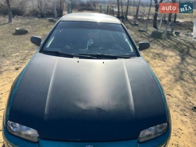 Зеленый Мазда 323, объемом двигателя 1.5 л и пробегом 326 тыс. км за 2700 $, фото 1 на Automoto.ua