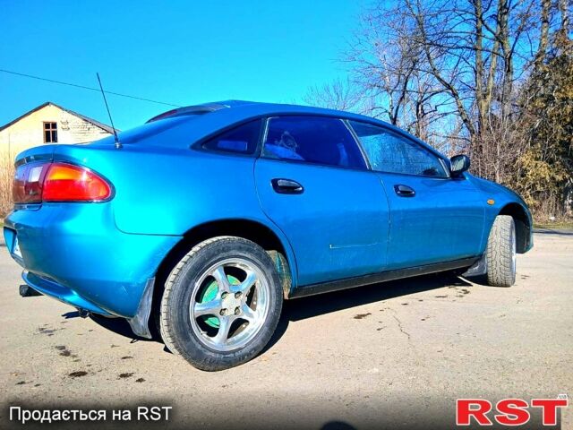 Зелений Мазда 323, об'ємом двигуна 1.5 л та пробігом 0 тис. км за 1370 $, фото 1 на Automoto.ua