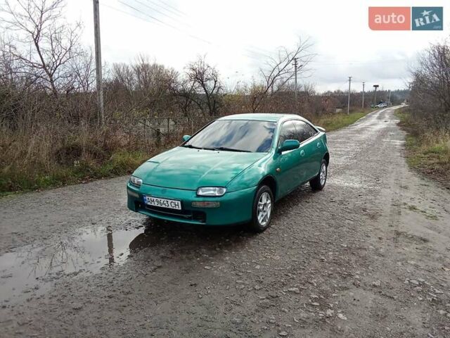 Зелений Мазда 323, об'ємом двигуна 1.49 л та пробігом 350 тис. км за 2100 $, фото 1 на Automoto.ua