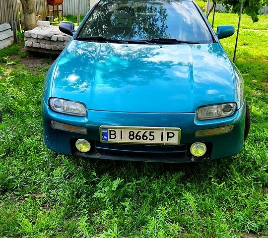 Зелений Мазда 323, об'ємом двигуна 1.5 л та пробігом 230 тис. км за 2200 $, фото 1 на Automoto.ua