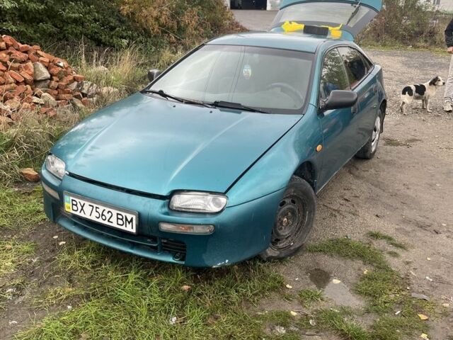 Зелений Мазда 323, об'ємом двигуна 0 л та пробігом 300 тис. км за 1300 $, фото 1 на Automoto.ua