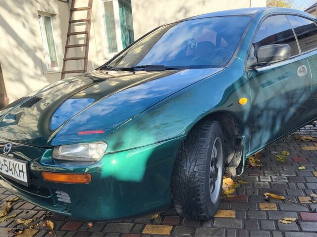 Зеленый Мазда 323, объемом двигателя 1.5 л и пробегом 270 тыс. км за 2199 $, фото 1 на Automoto.ua