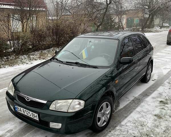 Зелений Мазда 323, об'ємом двигуна 1.5 л та пробігом 240 тис. км за 3600 $, фото 1 на Automoto.ua