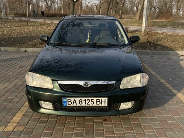 Зеленый Мазда 323, объемом двигателя 1.5 л и пробегом 260 тыс. км за 2600 $, фото 1 на Automoto.ua