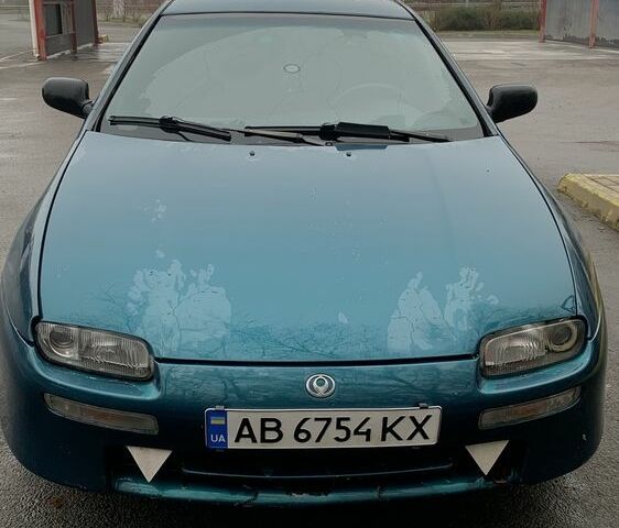 Зелений Мазда 323, об'ємом двигуна 1.5 л та пробігом 270 тис. км за 2000 $, фото 1 на Automoto.ua