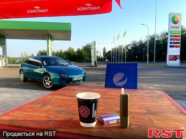 Зелений Мазда 323, об'ємом двигуна 1.5 л та пробігом 235 тис. км за 3000 $, фото 1 на Automoto.ua