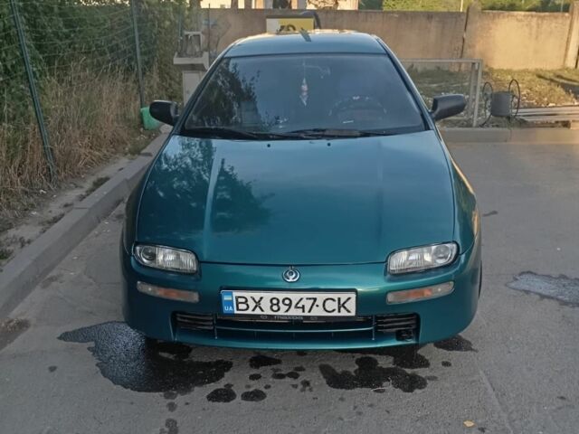 Зелений Мазда 323, об'ємом двигуна 1.5 л та пробігом 417 тис. км за 1999 $, фото 1 на Automoto.ua