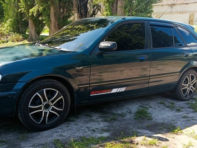 Зелений Мазда 323, об'ємом двигуна 1.5 л та пробігом 400 тис. км за 1900 $, фото 1 на Automoto.ua