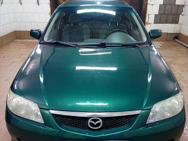 Зеленый Мазда 323, объемом двигателя 1.5 л и пробегом 380 тыс. км за 2600 $, фото 1 на Automoto.ua