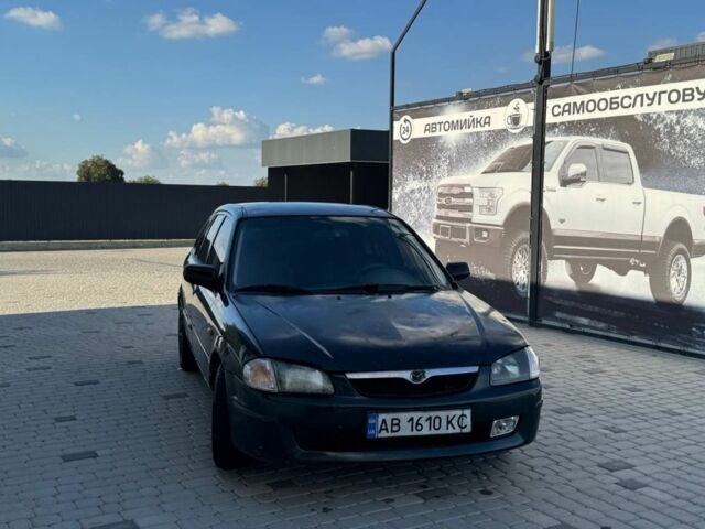 Зелений Мазда 323, об'ємом двигуна 2 л та пробігом 350 тис. км за 1807 $, фото 1 на Automoto.ua