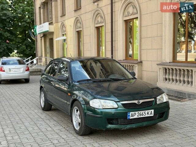 Зеленый Мазда 323, объемом двигателя 1.5 л и пробегом 250 тыс. км за 1750 $, фото 1 на Automoto.ua