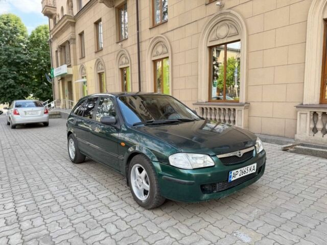 Зеленый Мазда 323, объемом двигателя 1.5 л и пробегом 250 тыс. км за 1850 $, фото 1 на Automoto.ua
