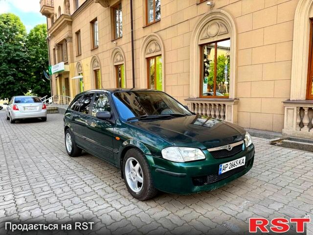 Зеленый Мазда 323, объемом двигателя 1.5 л и пробегом 250 тыс. км за 1850 $, фото 1 на Automoto.ua