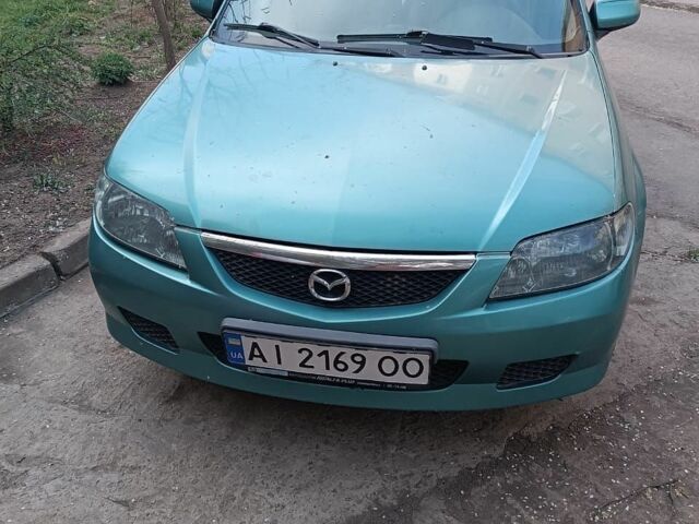 Зеленый Мазда 323, объемом двигателя 1.6 л и пробегом 370 тыс. км за 900 $, фото 1 на Automoto.ua