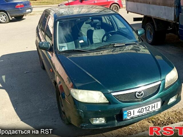 Зеленый Мазда 323, объемом двигателя 1.6 л и пробегом 210 тыс. км за 3000 $, фото 1 на Automoto.ua