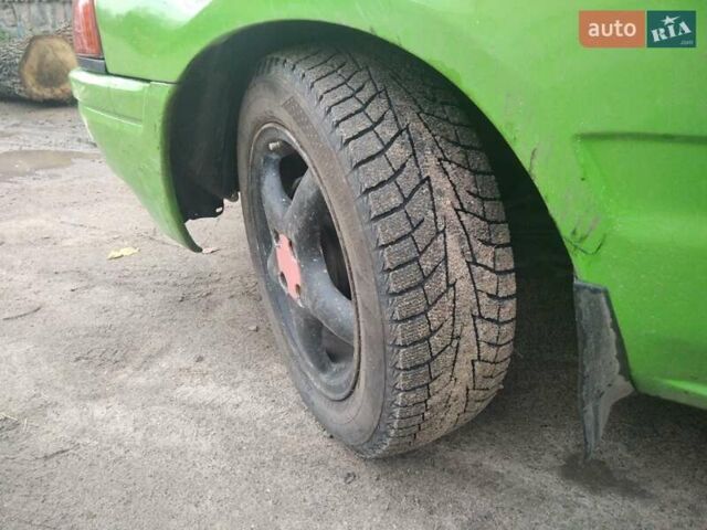 Зеленый Мазда 323, объемом двигателя 1.6 л и пробегом 444 тыс. км за 1700 $, фото 1 на Automoto.ua