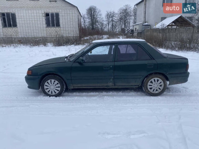 Зеленый Мазда 323, объемом двигателя 1.6 л и пробегом 500 тыс. км за 750 $, фото 1 на Automoto.ua
