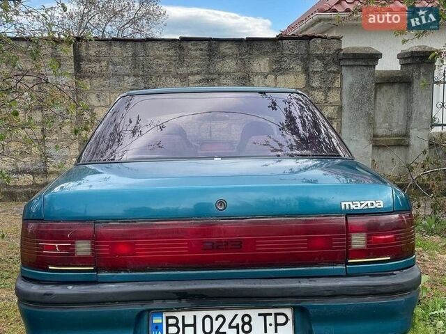 Зеленый Мазда 323, объемом двигателя 1.6 л и пробегом 140 тыс. км за 1300 $, фото 1 на Automoto.ua