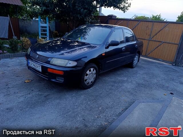 Зеленый Мазда 323, объемом двигателя 1.5 л и пробегом 235 тыс. км за 1600 $, фото 1 на Automoto.ua