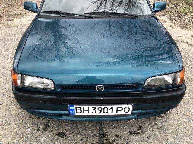 Зеленый Мазда 323, объемом двигателя 1.6 л и пробегом 310 тыс. км за 2200 $, фото 1 на Automoto.ua