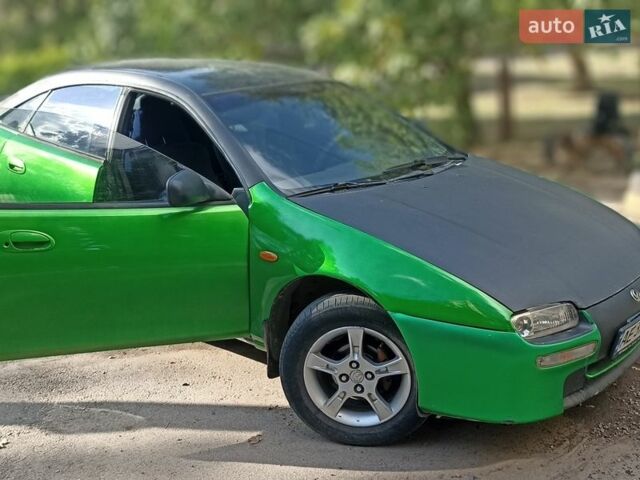 Зелений Мазда 323, об'ємом двигуна 1.5 л та пробігом 300 тис. км за 1700 $, фото 1 на Automoto.ua