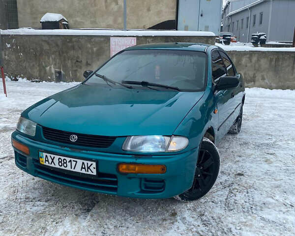Зеленый Мазда 323, объемом двигателя 1.5 л и пробегом 278 тыс. км за 1200 $, фото 1 на Automoto.ua