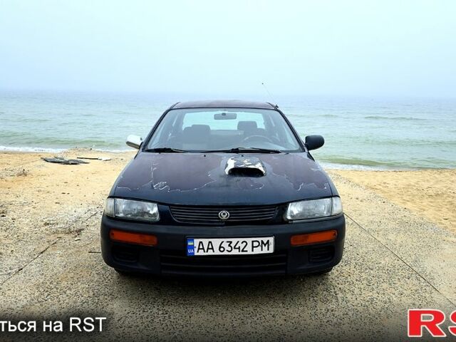 Зелений Мазда 323, об'ємом двигуна 1.7 л та пробігом 731 тис. км за 1200 $, фото 1 на Automoto.ua