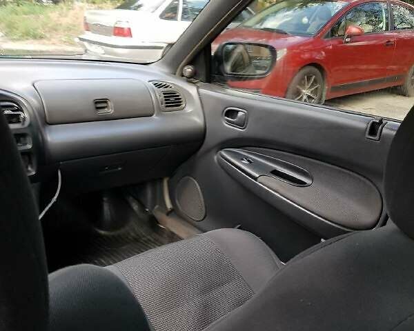 Зелений Мазда 323, об'ємом двигуна 1.5 л та пробігом 356 тис. км за 3300 $, фото 1 на Automoto.ua