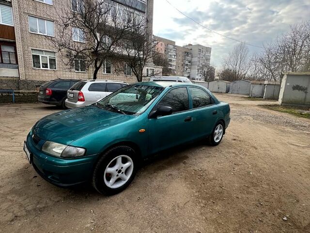 Зелений Мазда 323, об'ємом двигуна 1.5 л та пробігом 410 тис. км за 2200 $, фото 1 на Automoto.ua