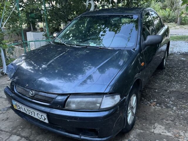 Зелений Мазда 323, об'ємом двигуна 1.5 л та пробігом 500 тис. км за 1100 $, фото 1 на Automoto.ua