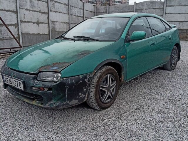 Зелений Мазда 323, об'ємом двигуна 1.5 л та пробігом 100 тис. км за 525 $, фото 1 на Automoto.ua
