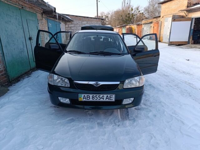 Зелений Мазда 323, об'ємом двигуна 1.5 л та пробігом 143 тис. км за 3800 $, фото 1 на Automoto.ua
