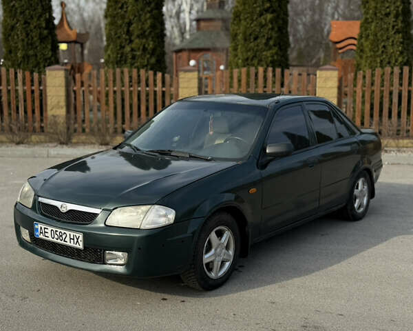 Зеленый Мазда 323, объемом двигателя 1.84 л и пробегом 254 тыс. км за 1850 $, фото 1 на Automoto.ua