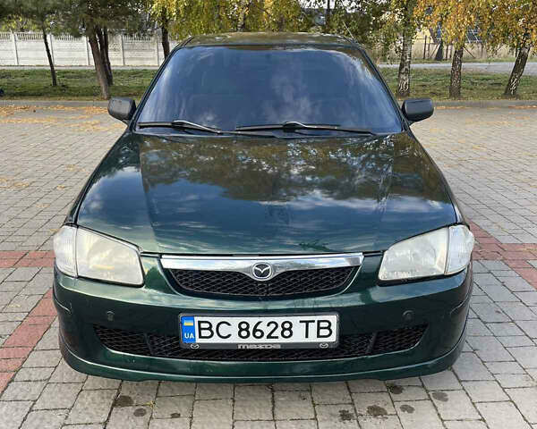 Зелений Мазда 323, об'ємом двигуна 1.6 л та пробігом 250 тис. км за 2600 $, фото 1 на Automoto.ua