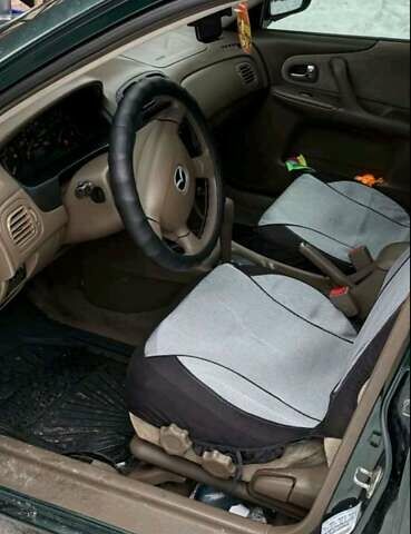 Зеленый Мазда 323, объемом двигателя 1.6 л и пробегом 250 тыс. км за 2400 $, фото 1 на Automoto.ua