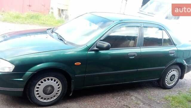 Зеленый Мазда 323, объемом двигателя 1.5 л и пробегом 237 тыс. км за 2500 $, фото 1 на Automoto.ua